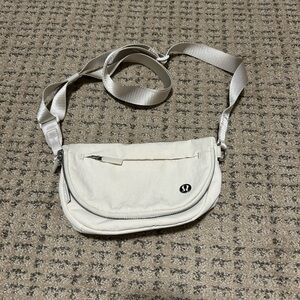 Lululemon small mini all night festival bag in bone cream color great condition